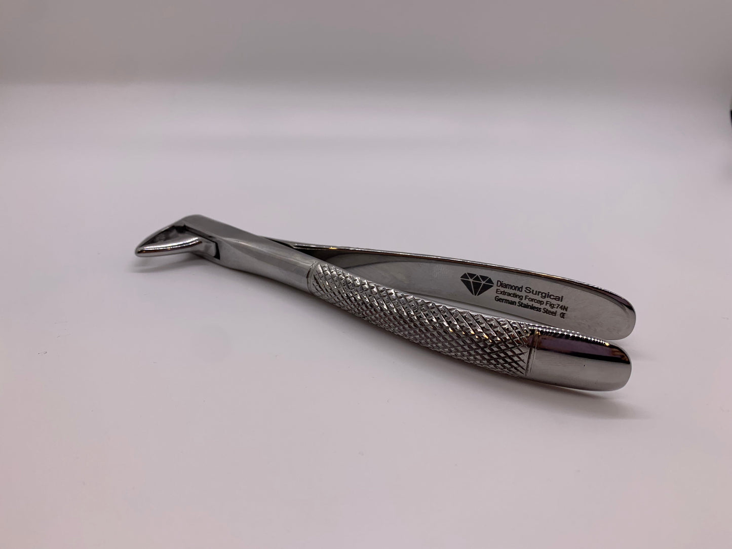 English Pattren Tooth Extracting Forcep Fig:74N With Serrated Jaws